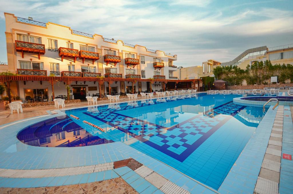 Falcon Naama Star Hotel cover